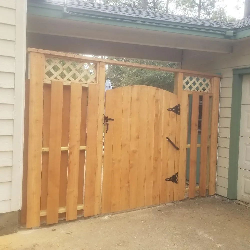 Local fence repair for homes in Spring, TX by Able Tractor Service