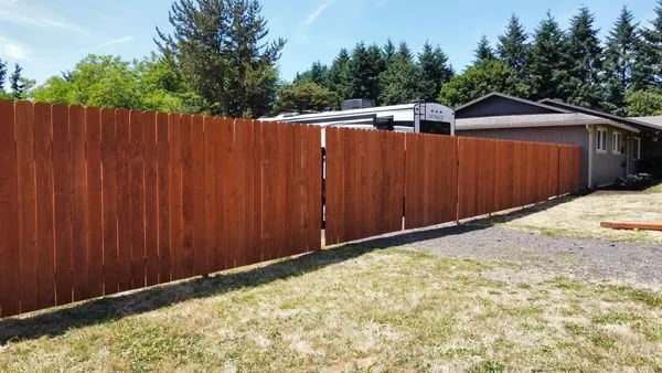 Affordable wood fence service for homes in Battle Ground, WA by API Construction