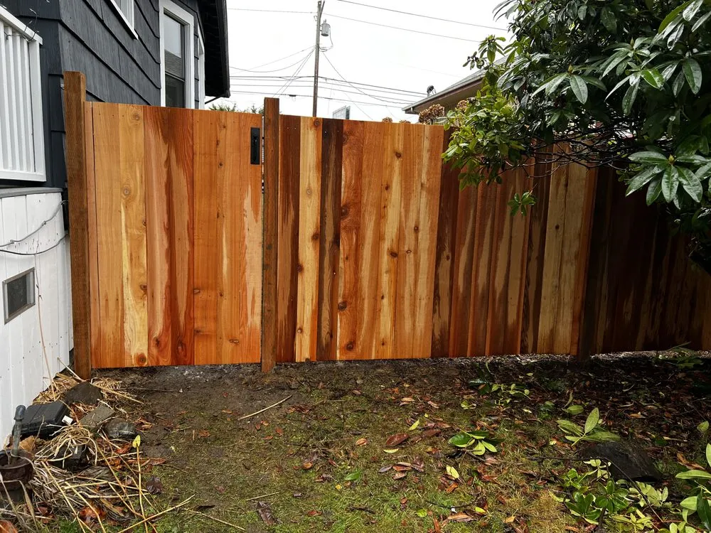 Professional fence repair for homes in Everett, WA by Aziz Construction
