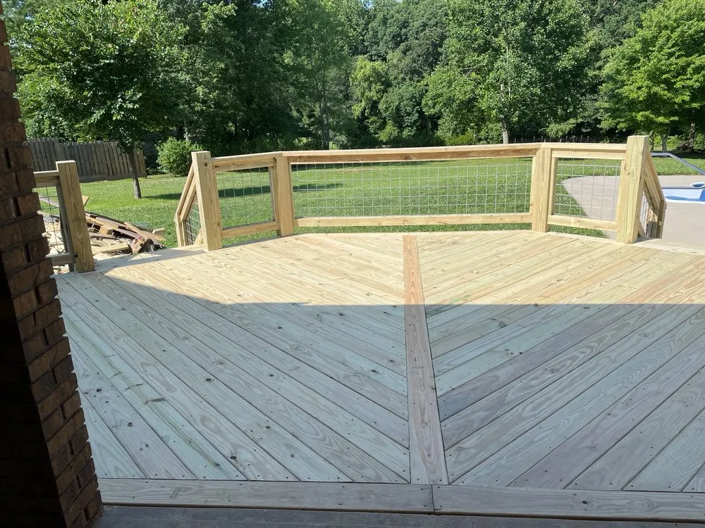 Local wood fence service for homes in Clyde, NC by B&B Construction Concept