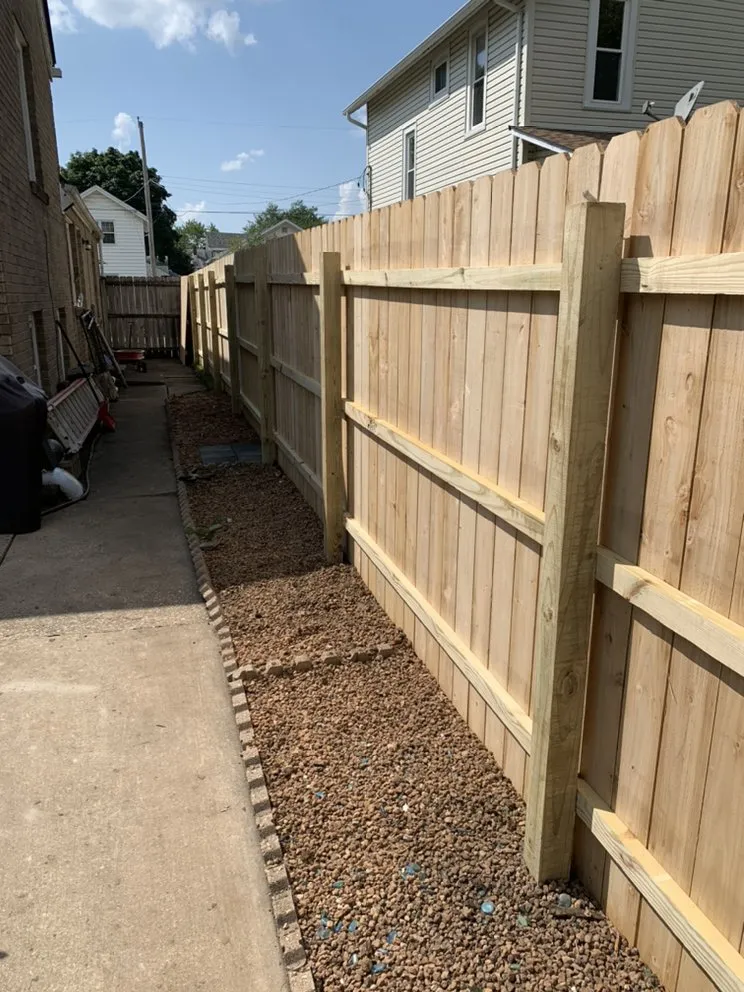 Quality wood fence service experts serving Belvidere, IL - B&M Construction