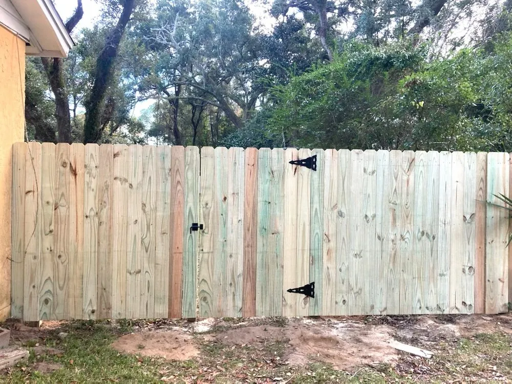 Professional vinyl fence installation for homes in Pace, FL by Brackish Construction