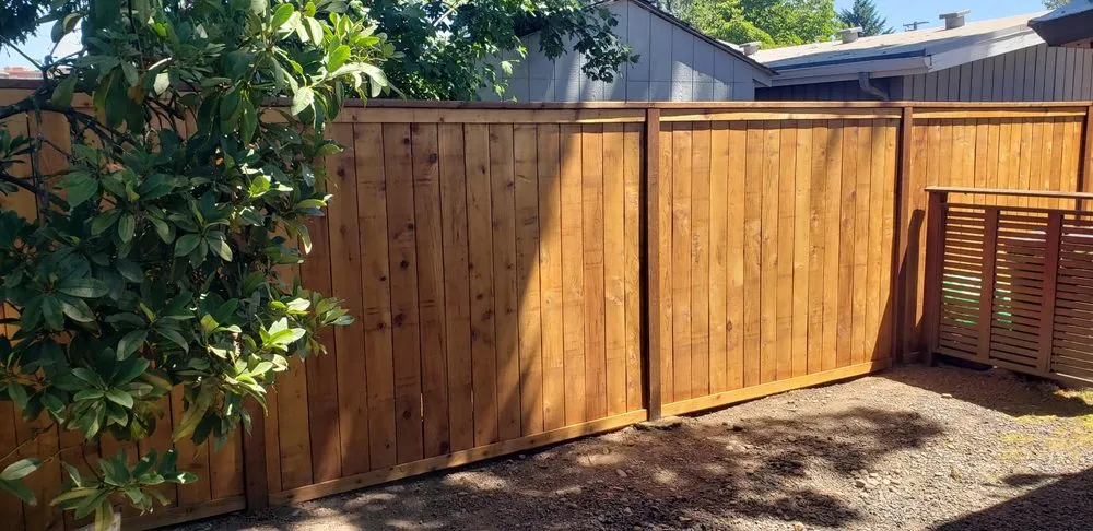 Affordable vinyl fence installation for homes in Eugene, OR by Bradley & Son