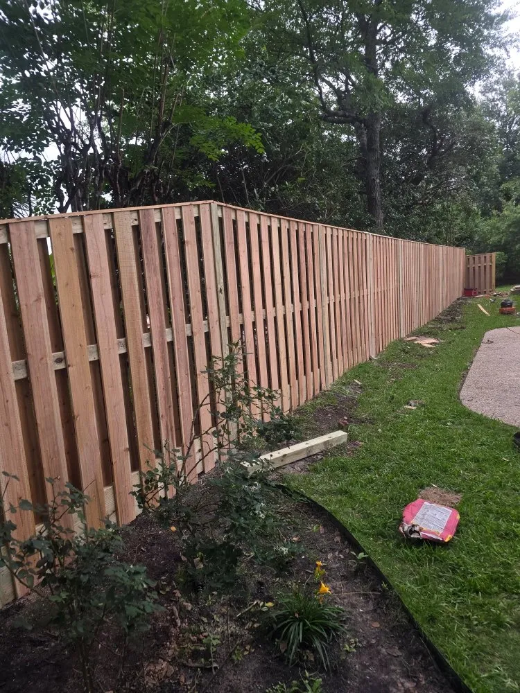 Top-rated wood fence service for homes in Conroe, TX by Burrell Ventures
