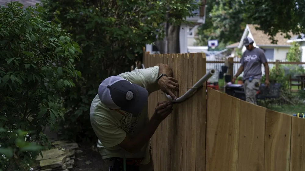 Quality vinyl fence installation for homes in Milwaukee, WI by Chisel + Vine
