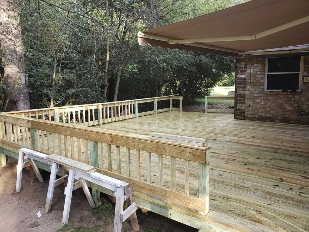 Quality wood fence service for homes in Conroe, TX by Courageous Construction
