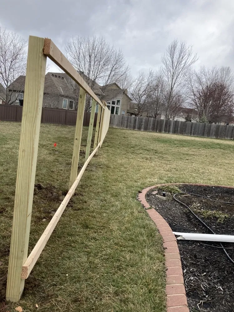 Local vinyl fence installation for homes in Lawrence, KS by C's Services