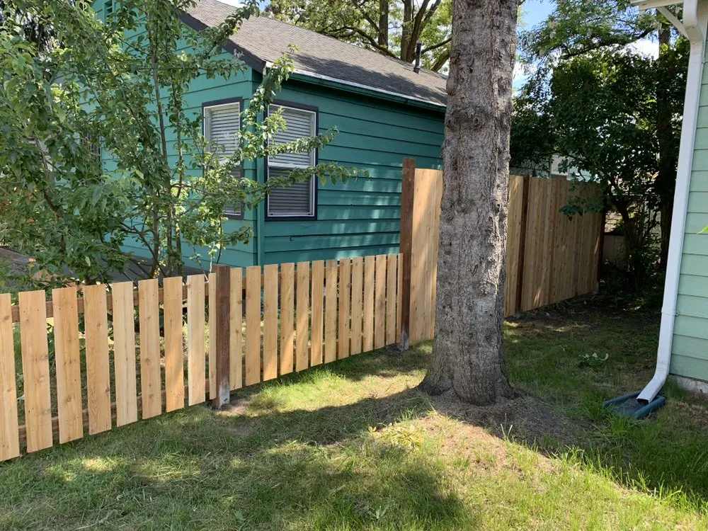 Trusted wood fence service for homes in Seattle, WA by Devoted Construction