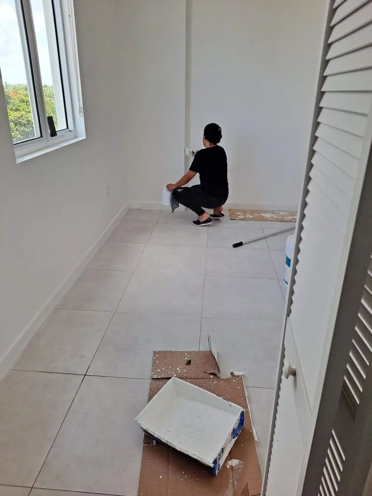 Quality wood fence service for homes in Miami, FL by Enos Solutions