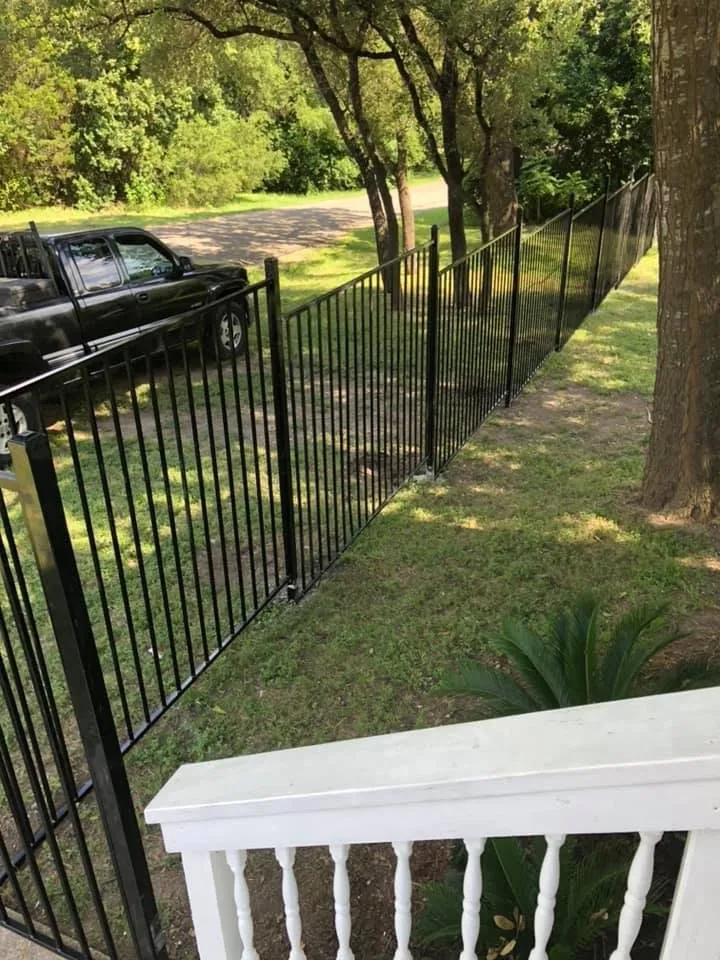 Affordable wood fence service for homes in Austin, TX by Evans Services