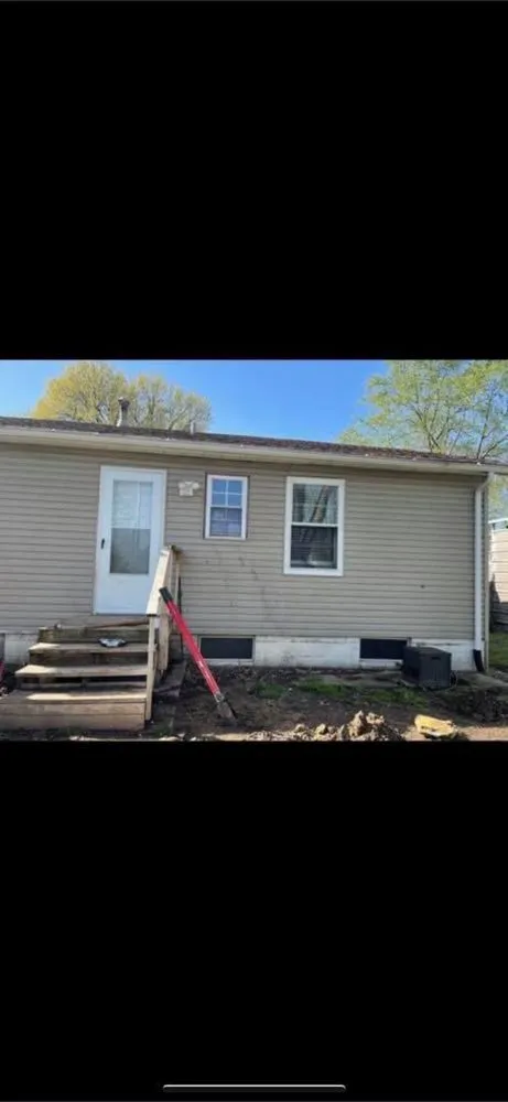 Quality wood fence service in Madison, IL by Evolution Contracting