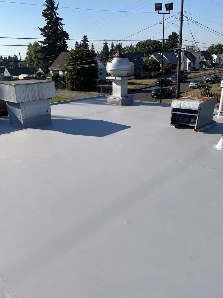 Affordable vinyl fence installation in Everett, WA by Evolution Roofing And Construction