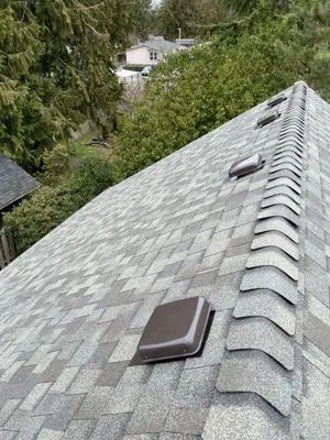 Evolution Roofing And Construction Logo