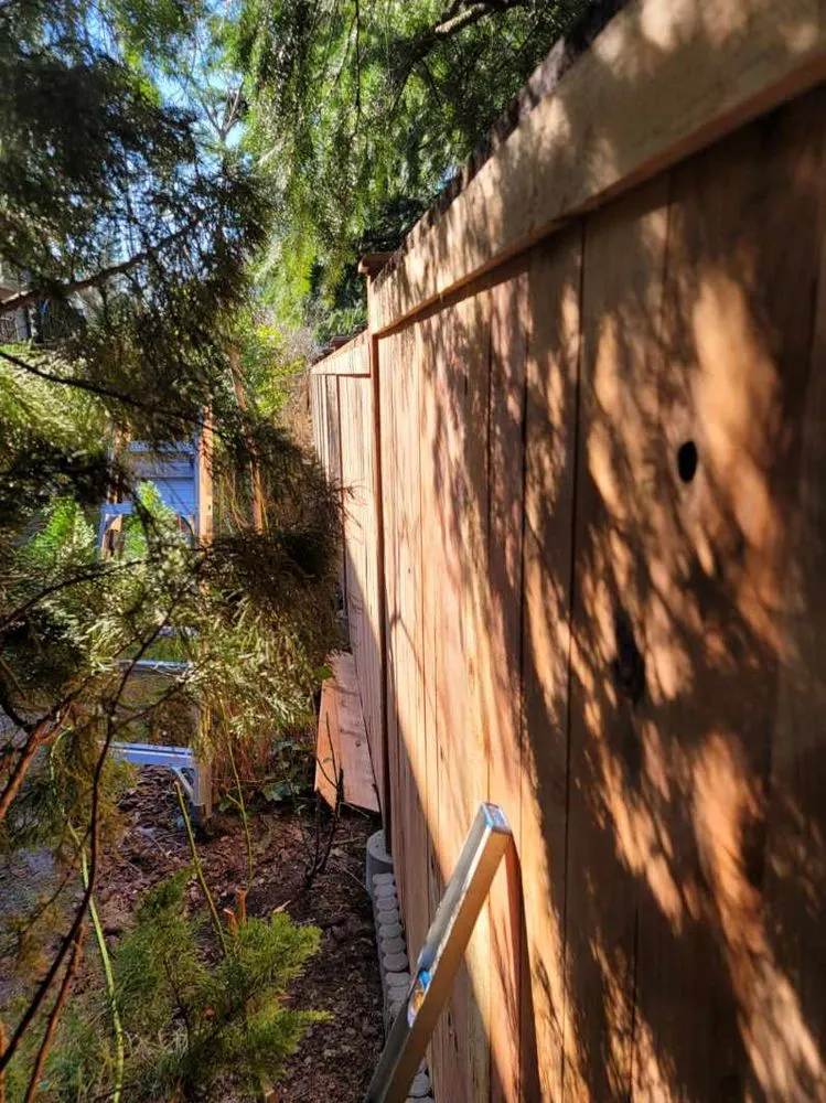 Affordable vinyl fence installation for homes in Eugene, OR by Facade Construction