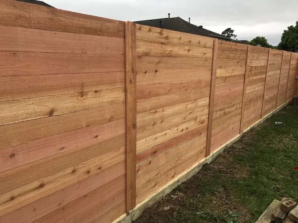 Affordable fence repair in Spring, TX by First Texas Tree Services