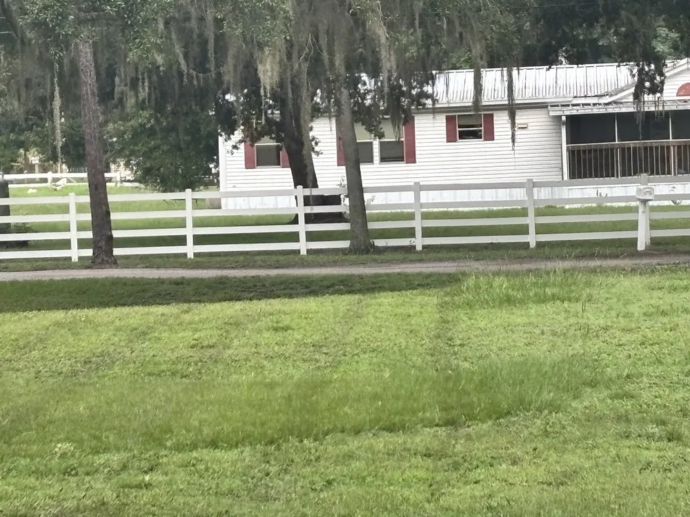 Expert wood fence service for homes in Dover, FL by G2 Services