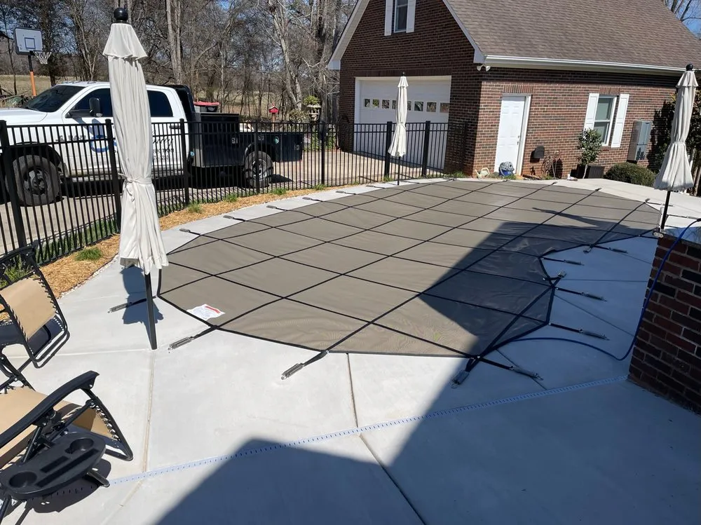 Professional chain link fencing for homes in Denver, NC by Infinity Pool Construction