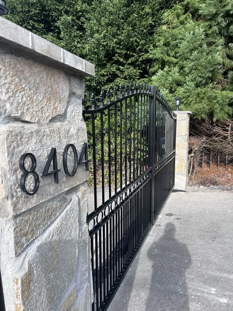 Expert wood fence service for homes in Bellevue, WA by Interactive Gates & Security