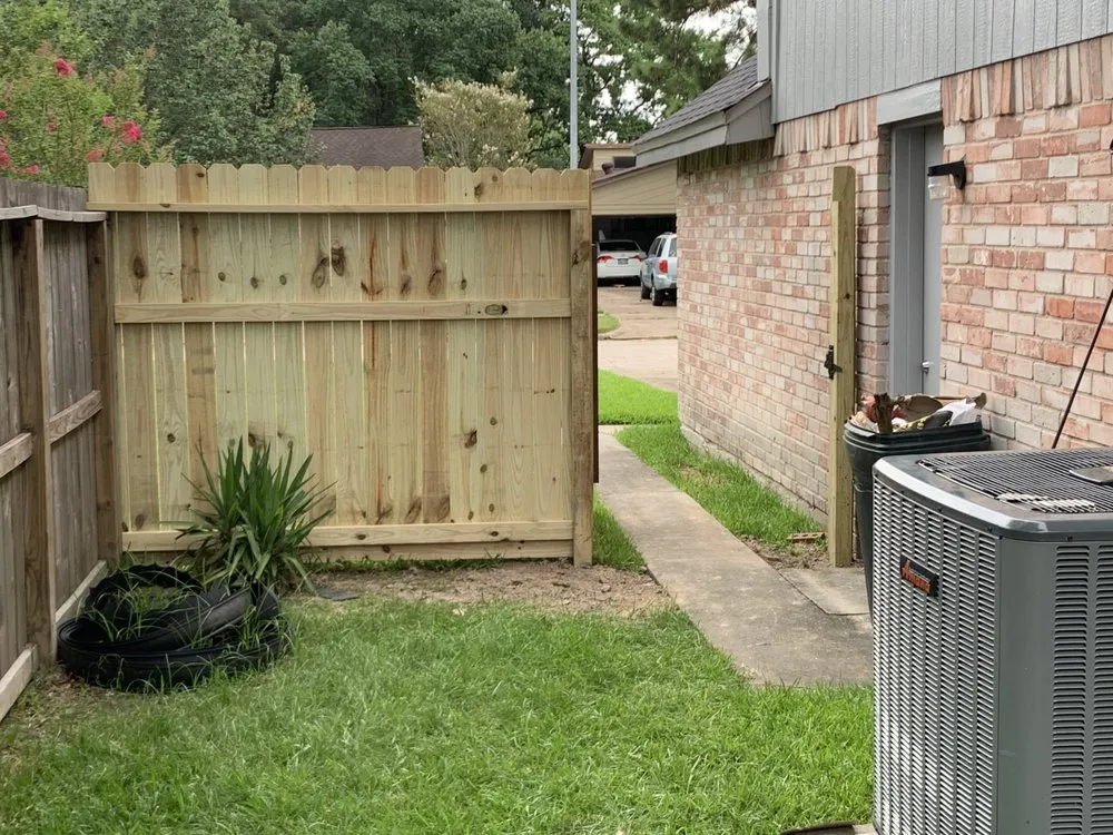 Professional wood fence service for homes in Spring, TX by JAG Construction