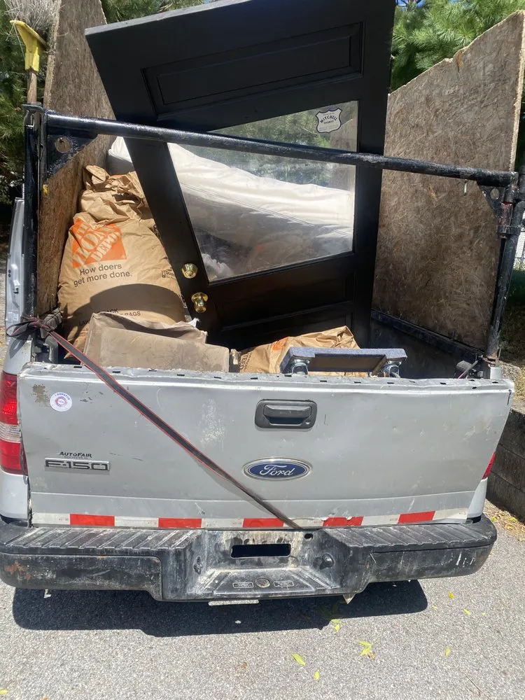 Professional vinyl fence installation in Lawrence, MA by Junk Runner
