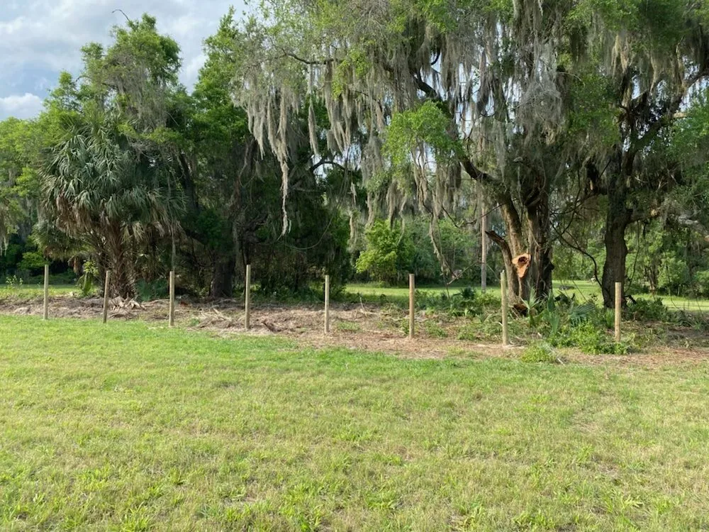 Expert wood fence service for homes in Reddick, FL by L&L Services