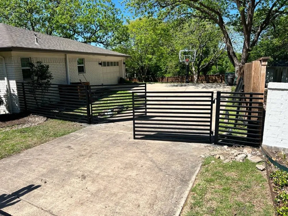 Professional wood fence service for homes in Hurst, TX by Man Welding