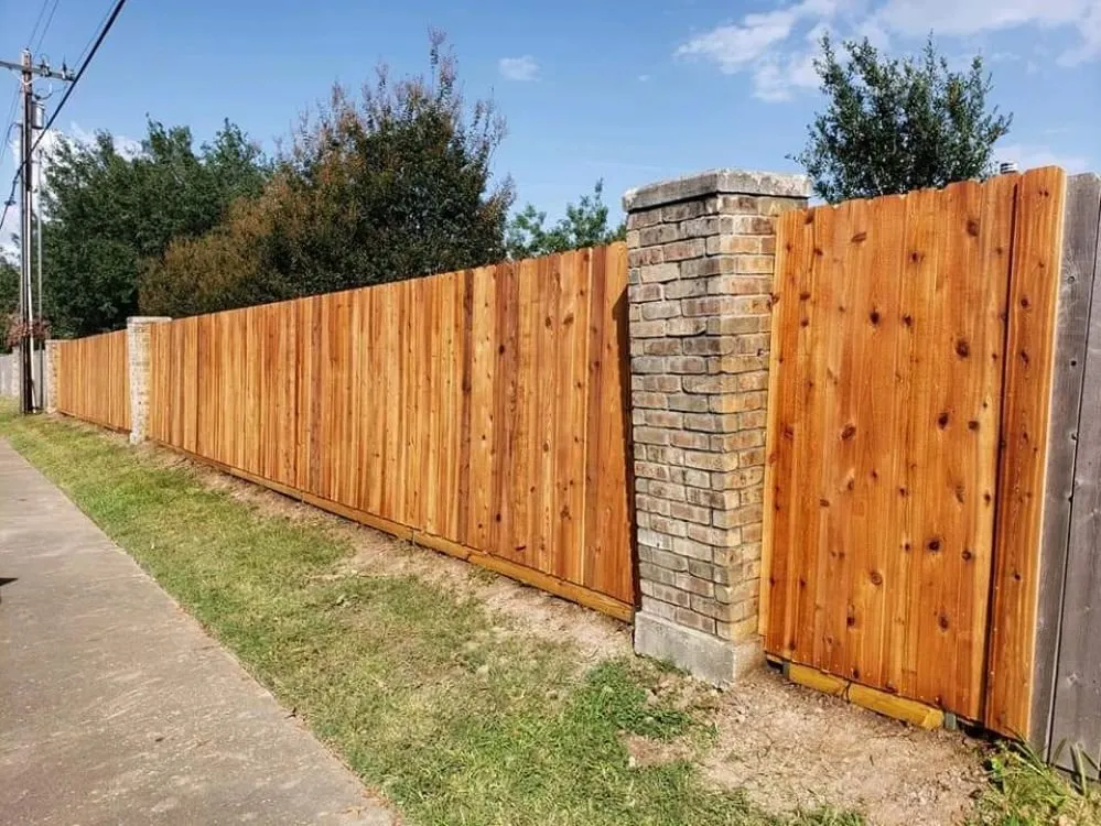 Professional wood fence service for homes in Bryan, TX by Mr. Fix It
