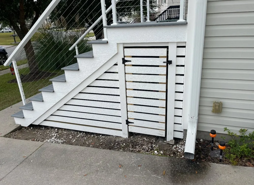 Affordable fence repair for homes in Fleming, GA by Quality Deck Builders