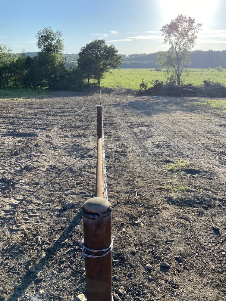 Professional wood fence service for homes in Bourbon, MO by Ranch Hands