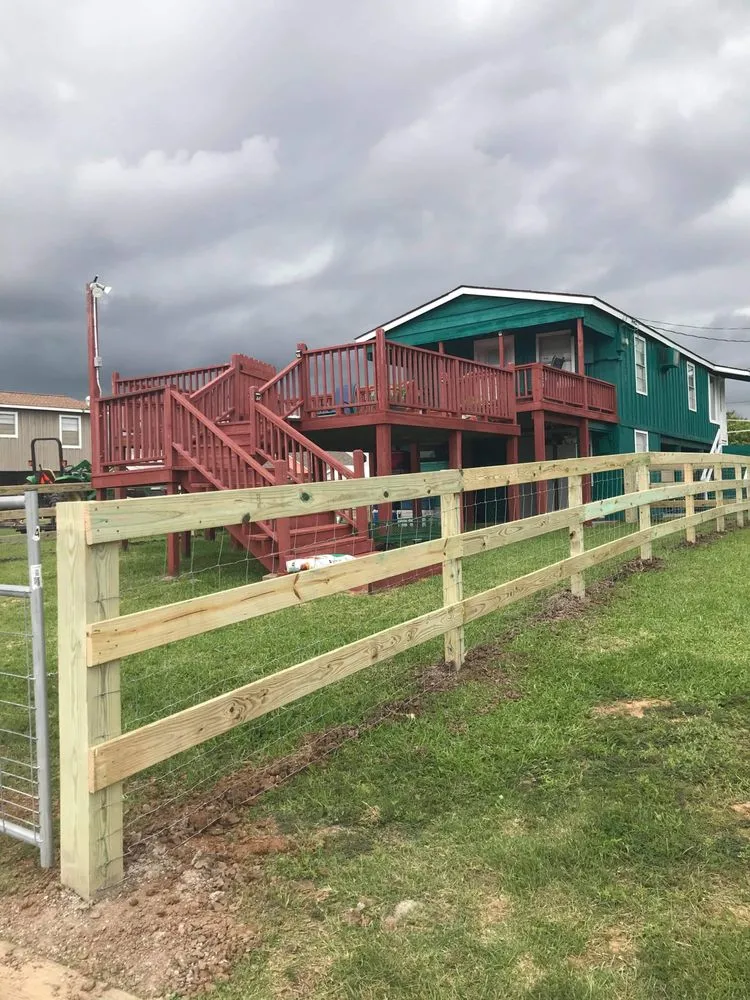 Local wood fence service for homes in Angleton, TX by Rock Solid Fence