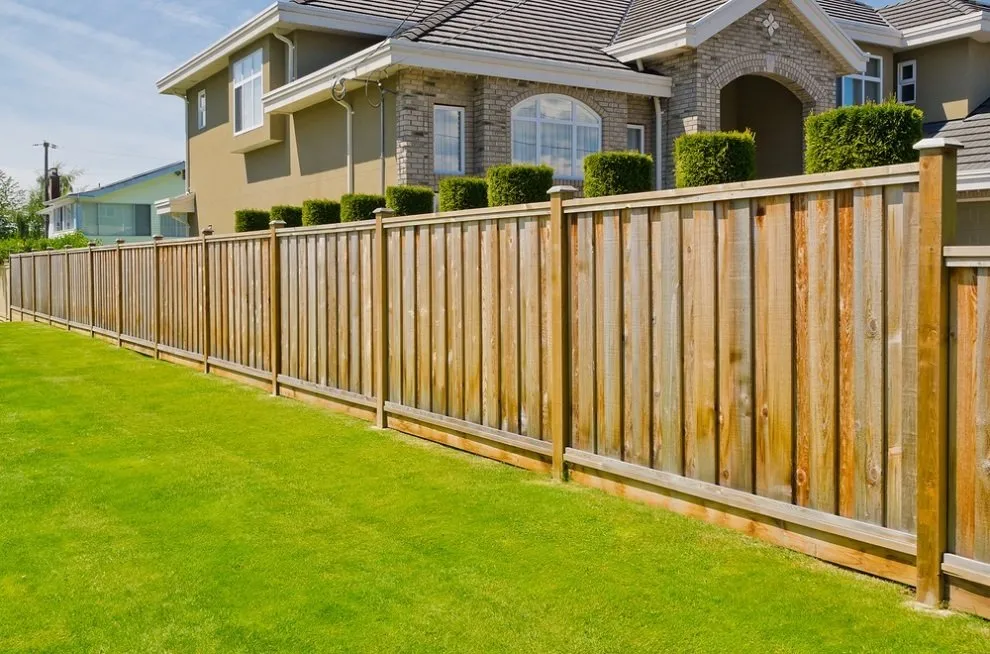 Affordable wood fence service in Dewitt, MI by SimTech Outdoor Solutions