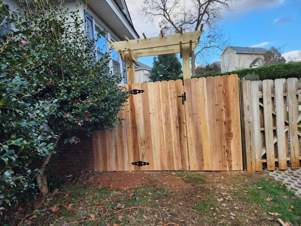 Affordable wood fence service for homes in Greenville, SC by Solid Foundations