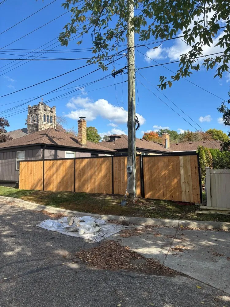 Quality wood fence service experts serving Fenton, MI - Solid Solutions