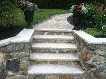Affordable vinyl fence installation in Kingston, NH by Stone Elements