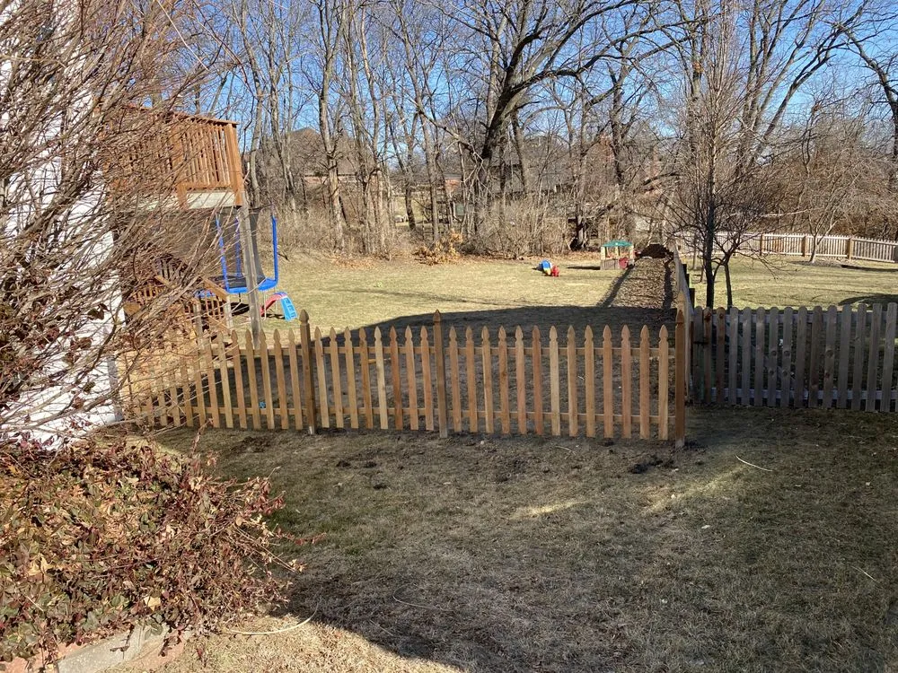 Expert wood fence service for homes in Saint Joseph, MO by Talbott Construction