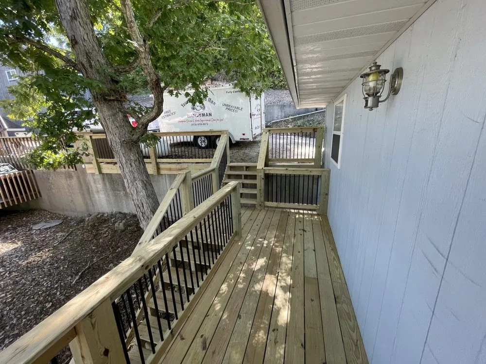 Trusted wood fence service for homes in Eldon, MO by Your Right Hand Man